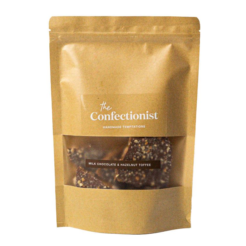 The Confectionist Handmade Hazelnut Toffee With Milk Chocolate Pouch 200g